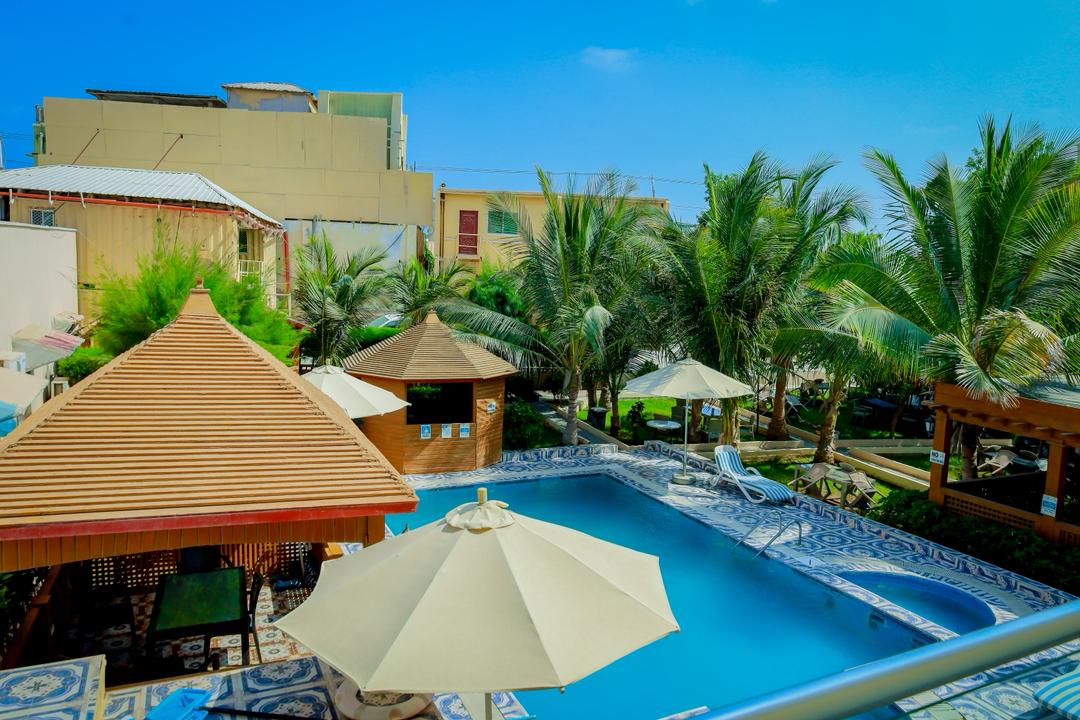 Swimming pool and gazebo at NAC Hotel